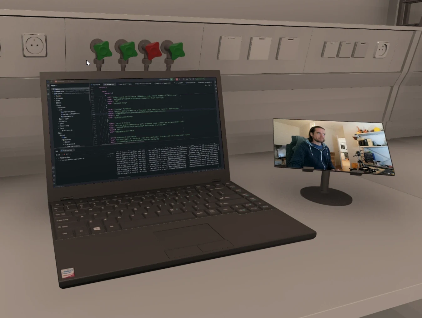 In-world screens showing live software development inside the station