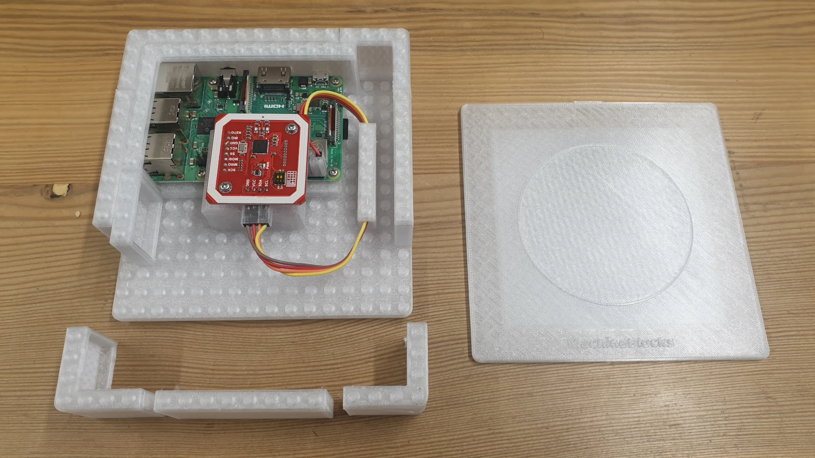 Laid-out device components: MachineBlocks housing, Raspberry Pi, reusable electronic modules and connectors.